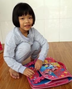 School bag and sandals for children